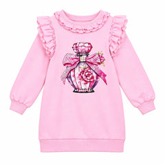 A charming dress from Giorgio Bambini featuring a perfume bottle design embellished with diamante detailing. Delicate pearl and ruffles add elegance.