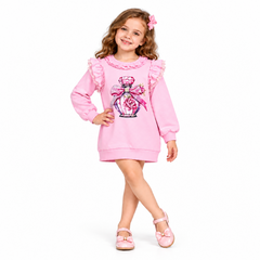 A charming dress from Giorgio Bambini featuring a perfume bottle design embellished with diamante detailing. Delicate pearl and ruffles add elegance.