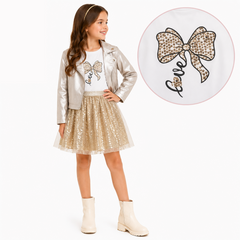 Girls 2 piece outfit combining a practical PVC jacket with a sparkly sequin dress. The dress features a delicate bow detail at the neckline, while the jacket finishes the look. Gold tones throughout create a coordinated, occasion-ready set. 