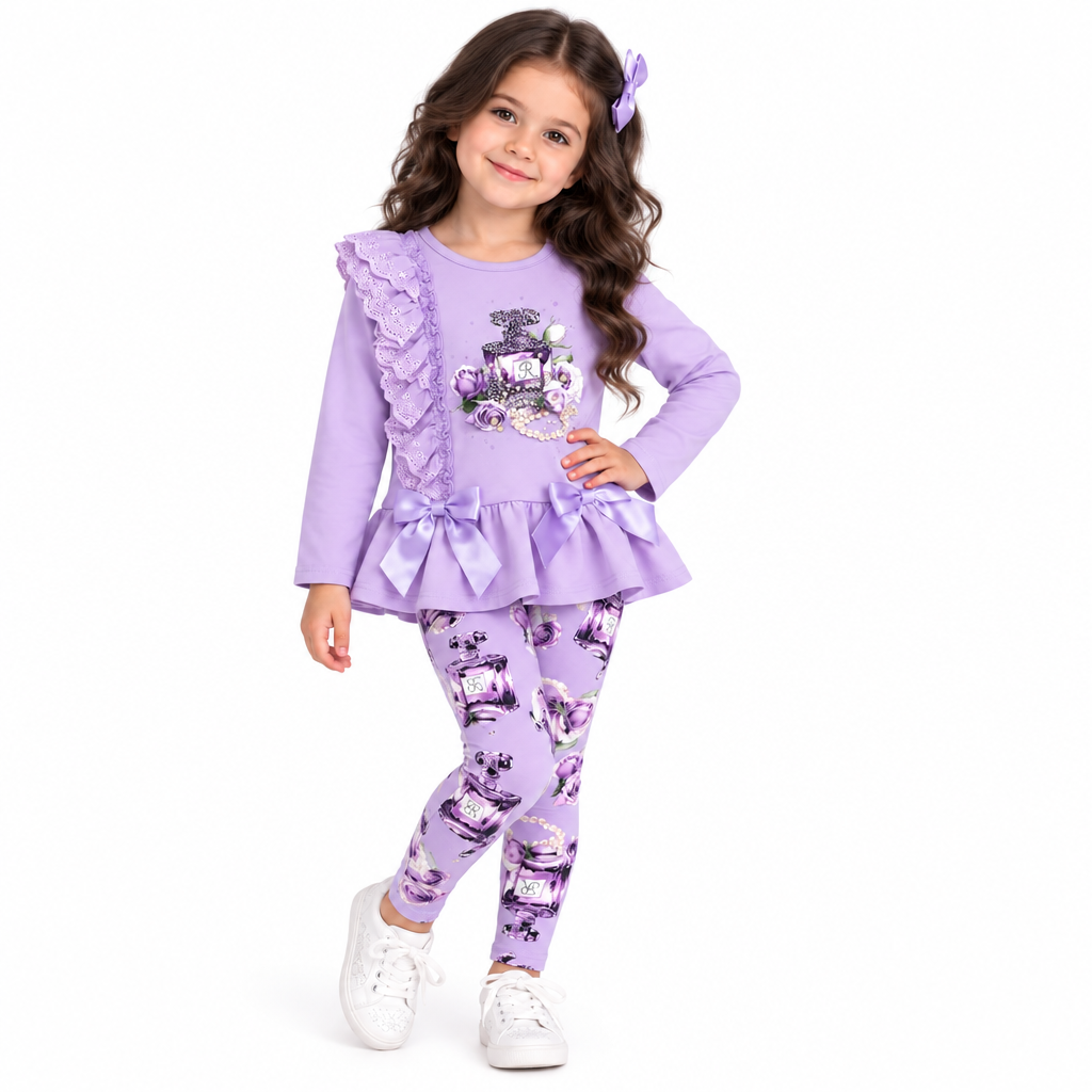 A charming lilac lace peplum top with matching print leggings from Giorgio Bambini featuring perfume design embellished with diamante detailing. Delicate pearl and lace ruffles add eleganc