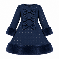 A navy blue long-sleeve navy blue diamante dress for toddlers  and girls featuring three large decorative diamante  bows on the front, and plush faux-fur trim on the cuffs and hem.