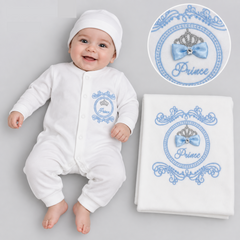 A timeless three-piece set for newborns and infants. The romper features elegant diamante detailing for a regal touch, paired with matching hat and a coordinating blanket. Crafted in soft white and pale blue tones, this set is perfect for special occasions and photoshoots.