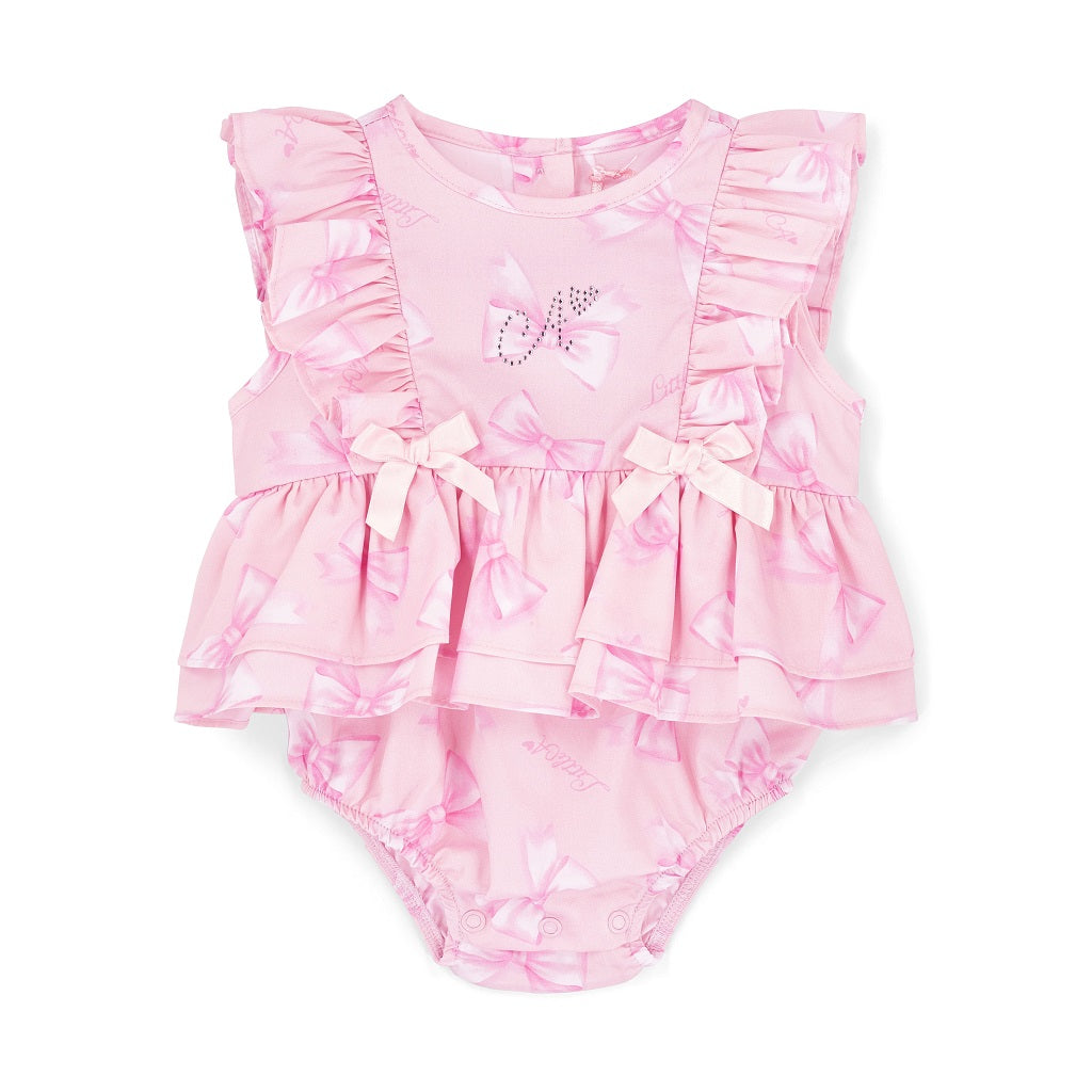 LITTLE A Perfectly Pink.&nbsp;The Odessa romper is made with cute all over bow print poplin, finished with frill and bow details finished with diamante branding. Pink Blossom