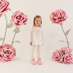 LITTLE A by ADee Little Bloom theme. The Demi legging set features a long sleeve jumper top with a sweet heart detail and peplum frill hem, paired with soft leggings finished with a subtle motif