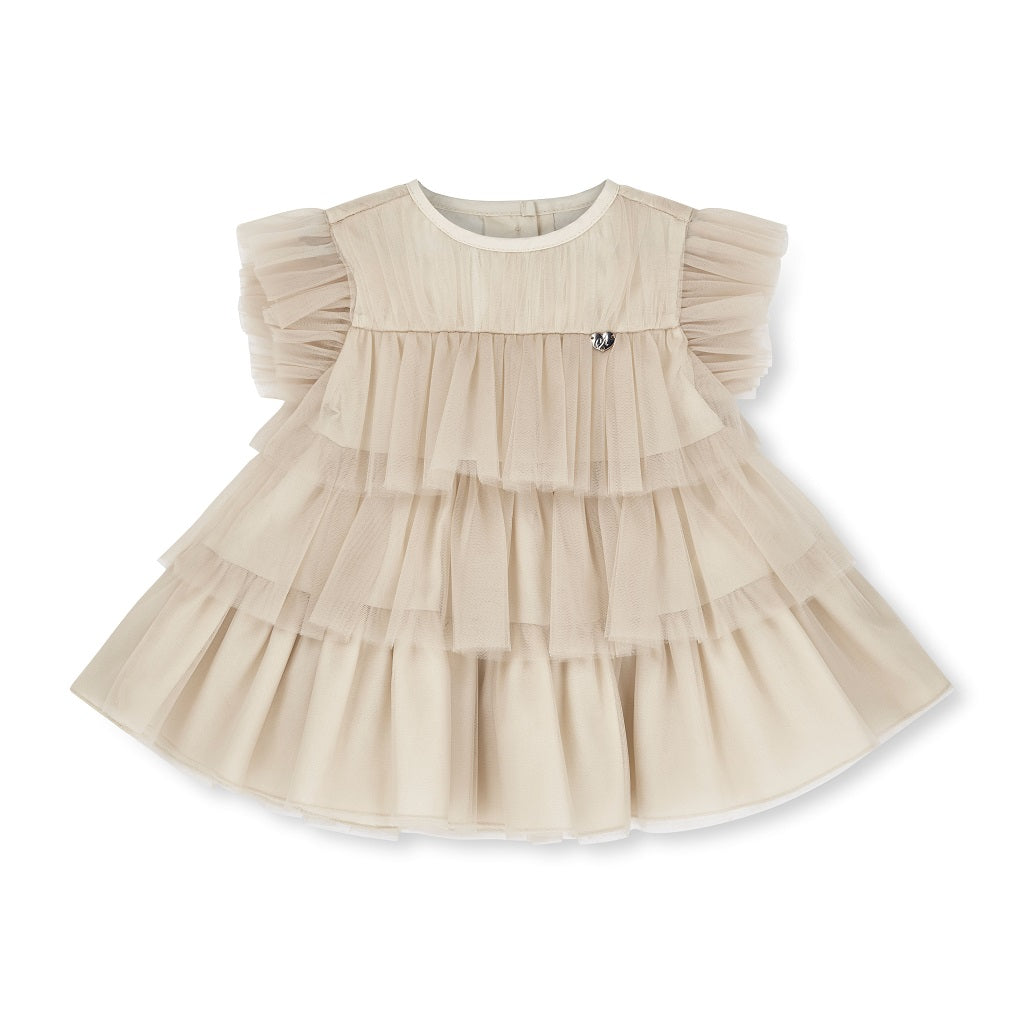 LITTLE A by ADee Little Locket theme. The Ella dress features layered tulle frills and flutter sleeves. Finished with a tiered skirt for a beautifully floaty, dressy look. Stone Beige
