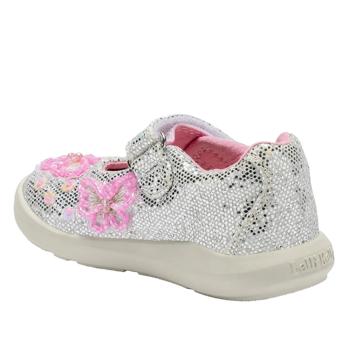 LELLI KELLY Sylvie dolly shoes bring enchanting style to little feet. These silver glitter shoes feature beaded butterflies with beaded floral accents across the front and sides, creating a magical sparkle with every step.