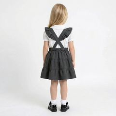 LELLI KELLY Bryony Grey Frill Pinafore featuring cross over strap detail on the back and charm with LELLI KELLY logo on the front