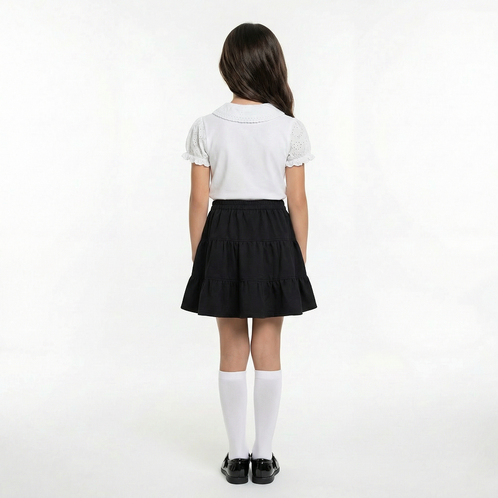 LELLI KELLY Bailey Black Skirt, featuring the signature charm branding logo