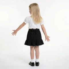 LELLI KELLY Betty Black Skirt combine style with practical comfort. These charming skirts feature a decorative bow detail on the back and an iconic LELLI KELLY logo charm