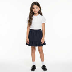 LELLI KELLY Betty Navy Skirt combine style with practical comfort. These charming skirts feature a decorative bow detail on the back and an iconic LELLI KELLY logo charm