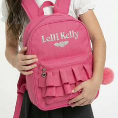 Britanny Pink backpack with ruffled design and pink pom-pom, featuring 'LELLI KELLY' branding.