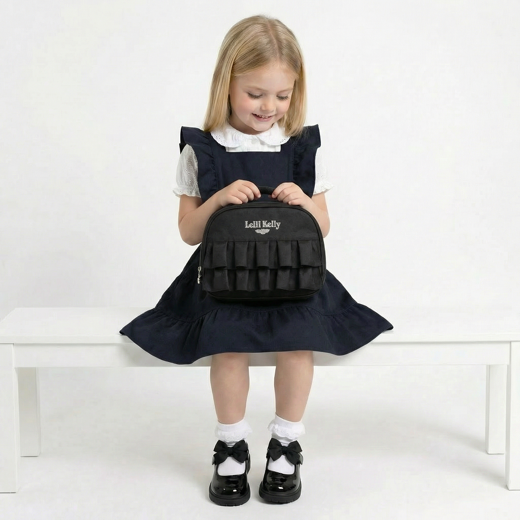 Black ruffled lunch bag with 'Lelli Kelly' branding.