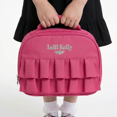 Pink ruffled lunch bag with 'Lelli Kelly' branding.