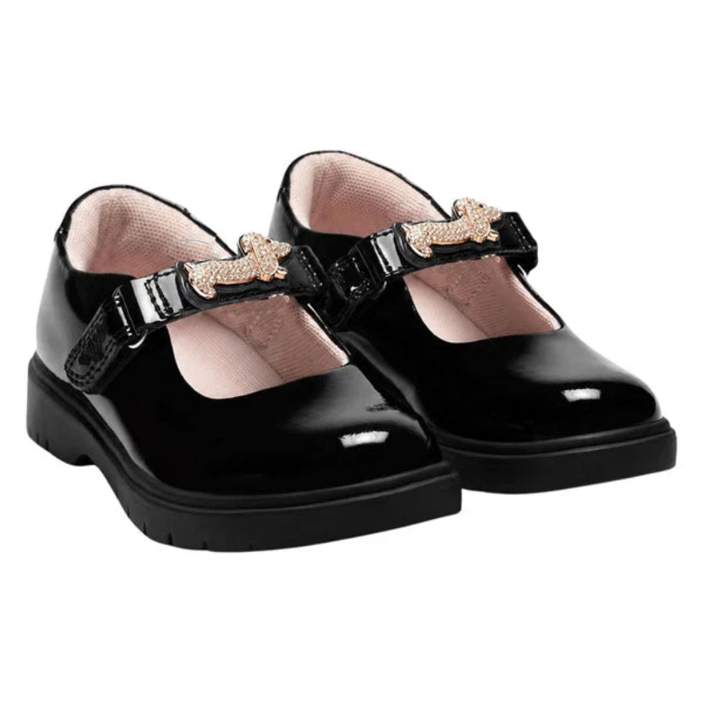 LELLI KELLY Taylor shoes in classic black patent leather, featuring charming diamante dog straps that add a playful touch. The interchangeable straps