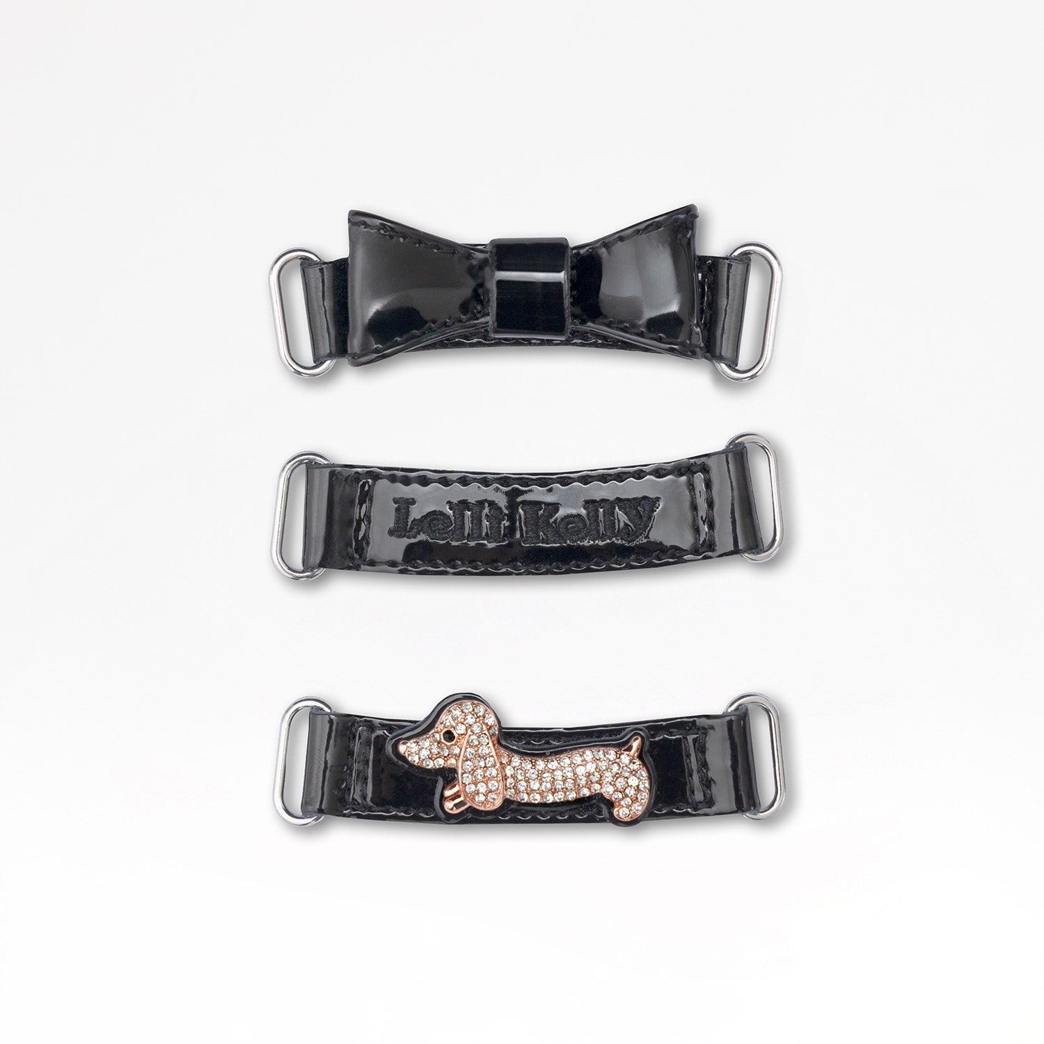 LELLI KELLY Taylor shoes in classic black patent leather, featuring charming diamante dog straps that add a playful touch. The interchangeable straps