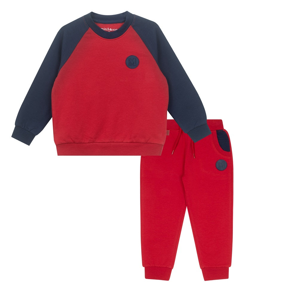 MITCH &amp; SON Raglan crewneck tracksuit with contrast sleeves and pockets finished with rubber logo badge on both. Chilli Red