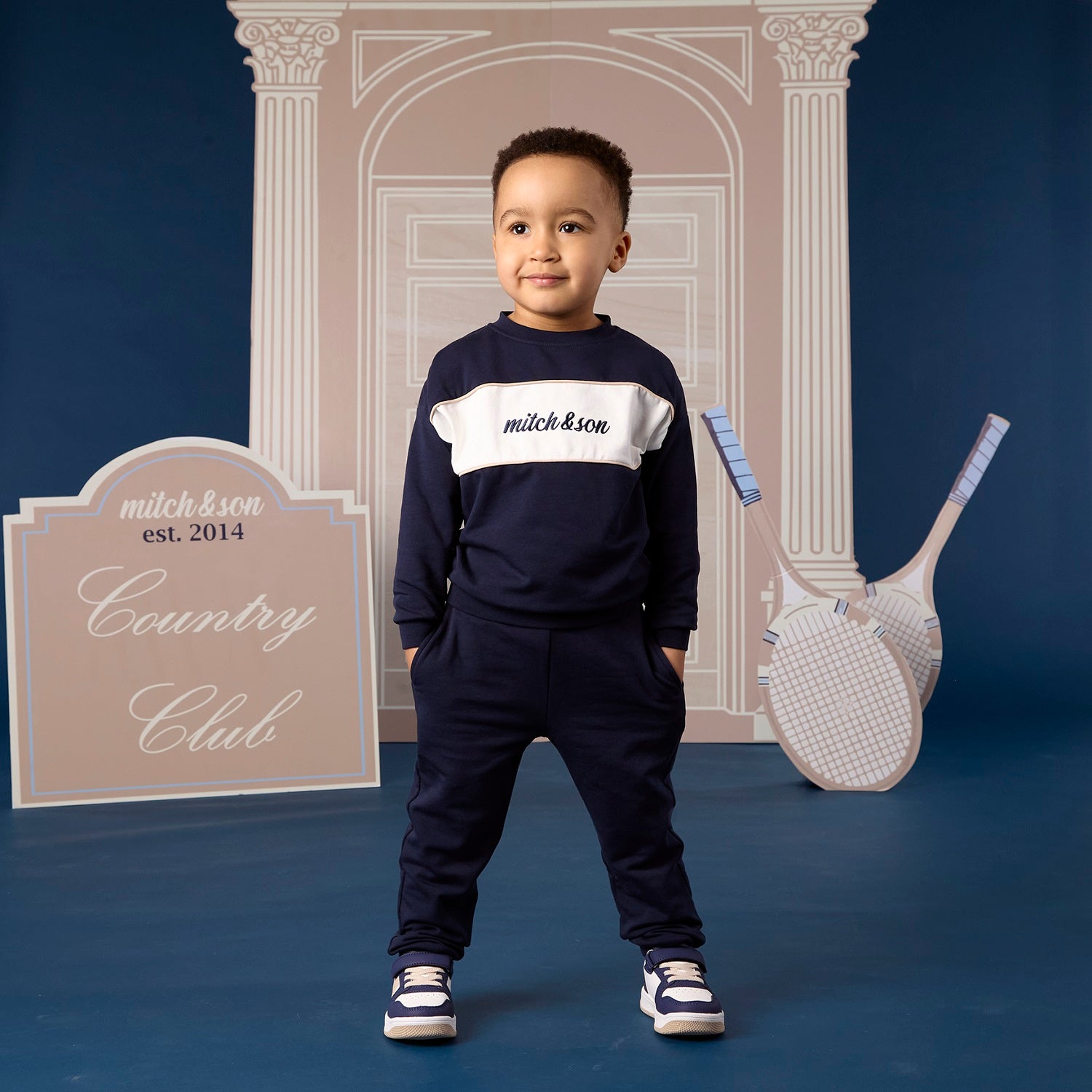 MITCH & SON Classic Collection. The Sean tracksuit features a colour block design a sweatshirt and matching joggers.  Dark Navy