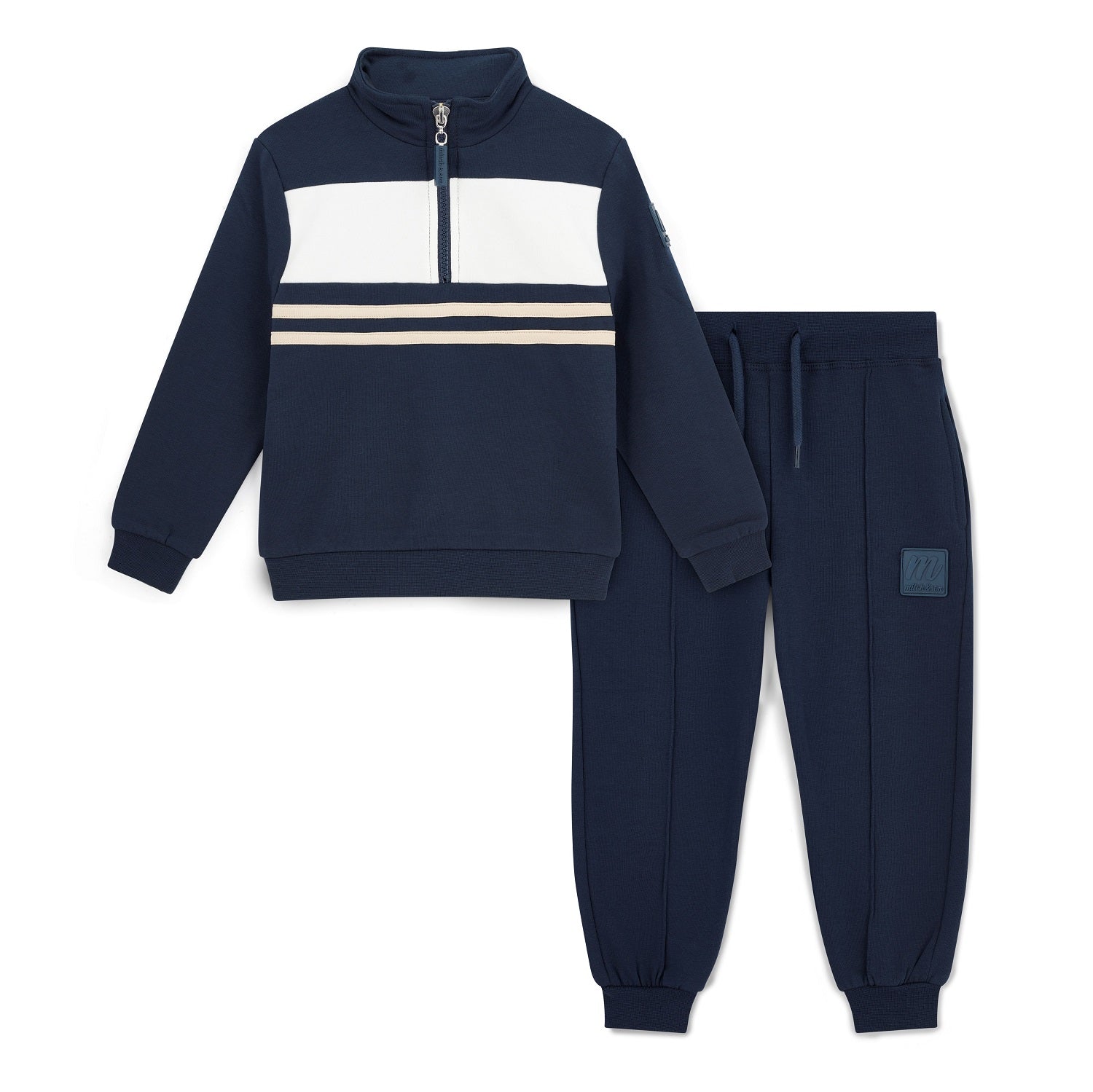 MITCH & SON Classic Collection. The Samson tracksuit features a sleek colour block design with a 1/4 zip top and coordinating joggers. Designed with elasticated trims for comfort and finished with understated logo detailing. Dark Navy
