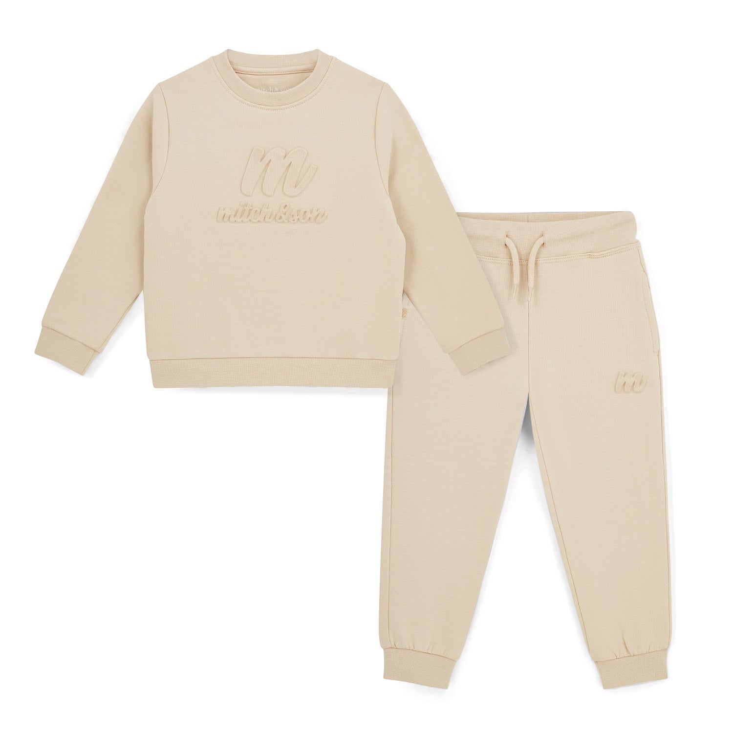 MITCH & SON Classic Collection. The Seth tracksuit features a sweatshirt with subtle embossed logo detailing and matching joggers. Designed with ribbed trims for a comfortable, easy fit. Stone Beige