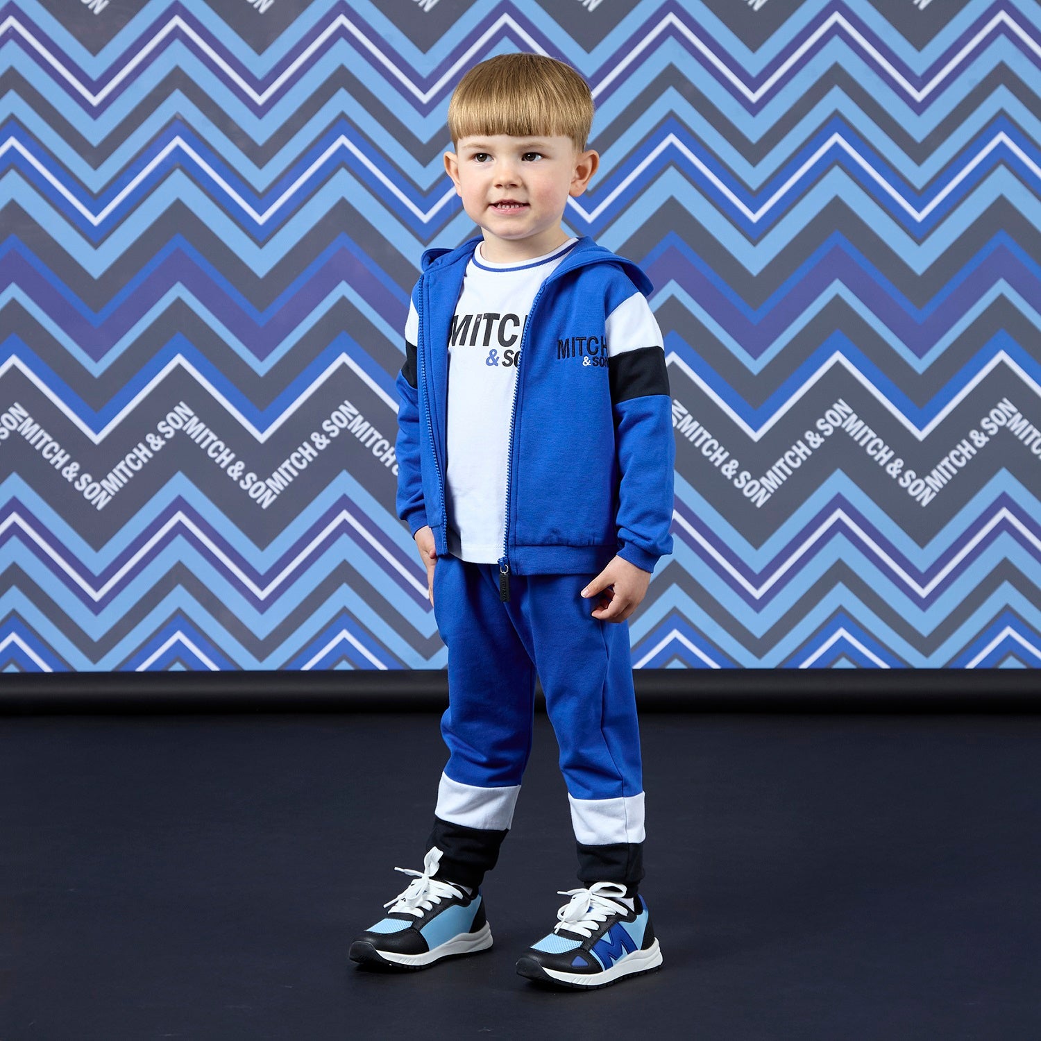 MITCH & SON Winter Chevron. The Wake tracksuit includes a zipper hoodie and matching joggers with bold colour blocking design.