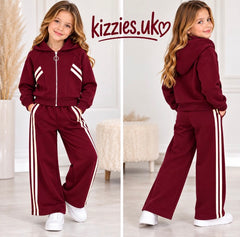 Girls two-piece tracksuit with white stripes. The set includes a zip-up hoodie and matching wide-leg pants.