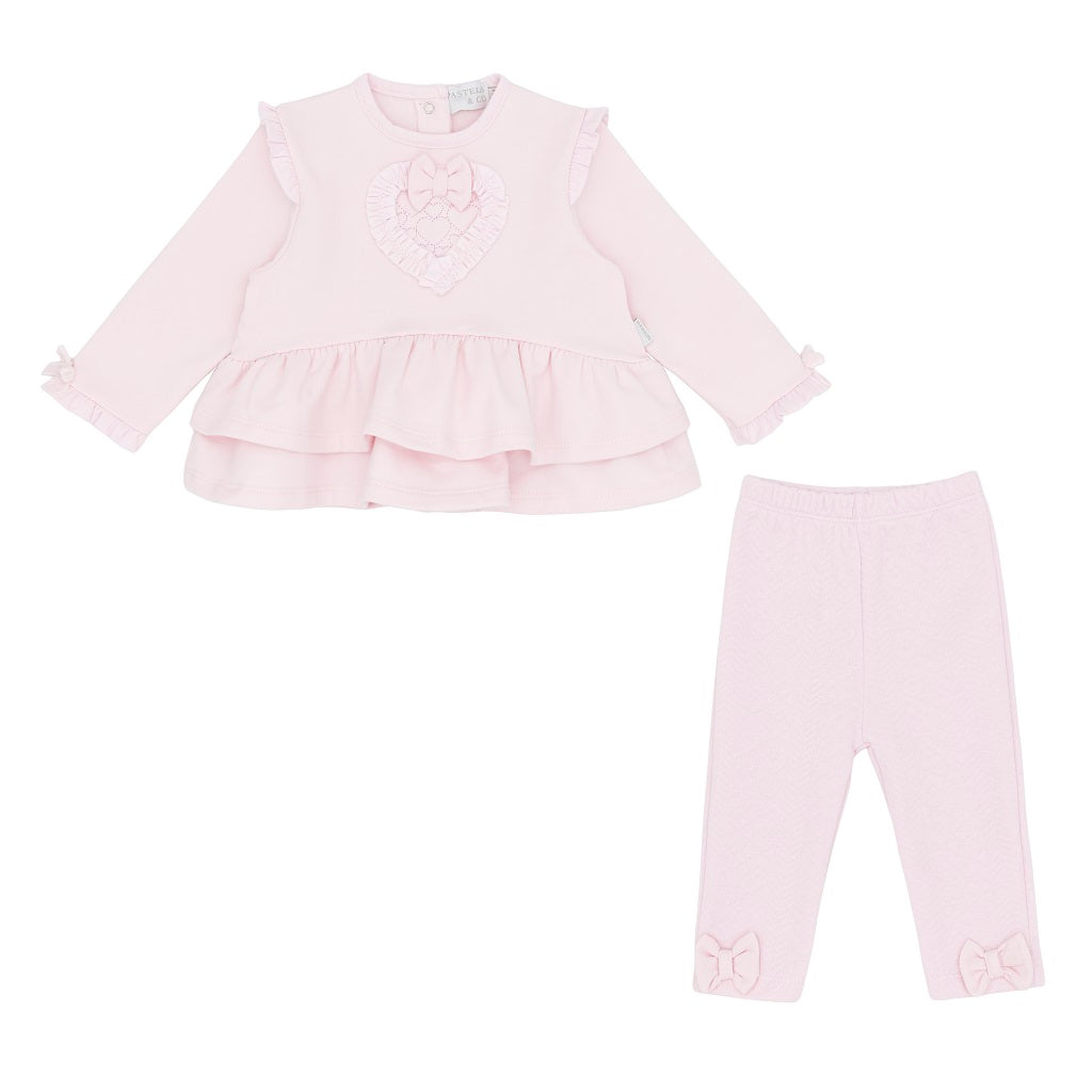 Pastels & Co - Hearts & Bows Story. The Eliana Legging Set in soft pale pink offers timeless elegance for baby girls.