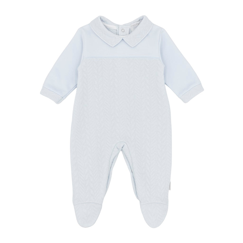 Pastels &  Co - Herringbone Smash Story. The Noah all-in-one in soft pale blue offers timeless elegance for baby boys.