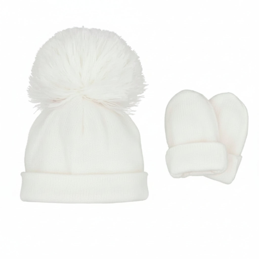 Pastels & Co white jersey baby beanie with a large fluffy pom-pom and matching folded mittens.