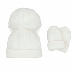 Pastels & Co white jersey baby beanie with a large fluffy pom-pom and matching folded mittens.