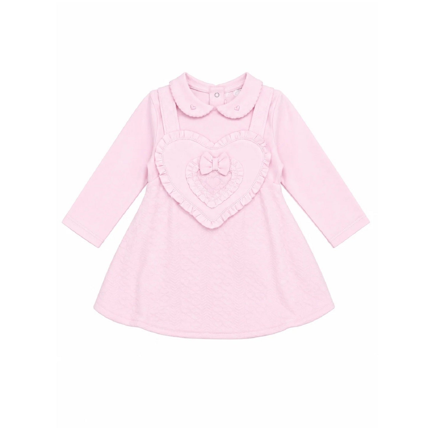 Pastels & Co - Hearts & Bows Story. The Mia puff ball dress in soft pale pink offers timeless elegance for baby girls.