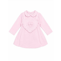 Pastels & Co - Hearts & Bows Story. The Mia puff ball dress in soft pale pink offers timeless elegance for baby girls.