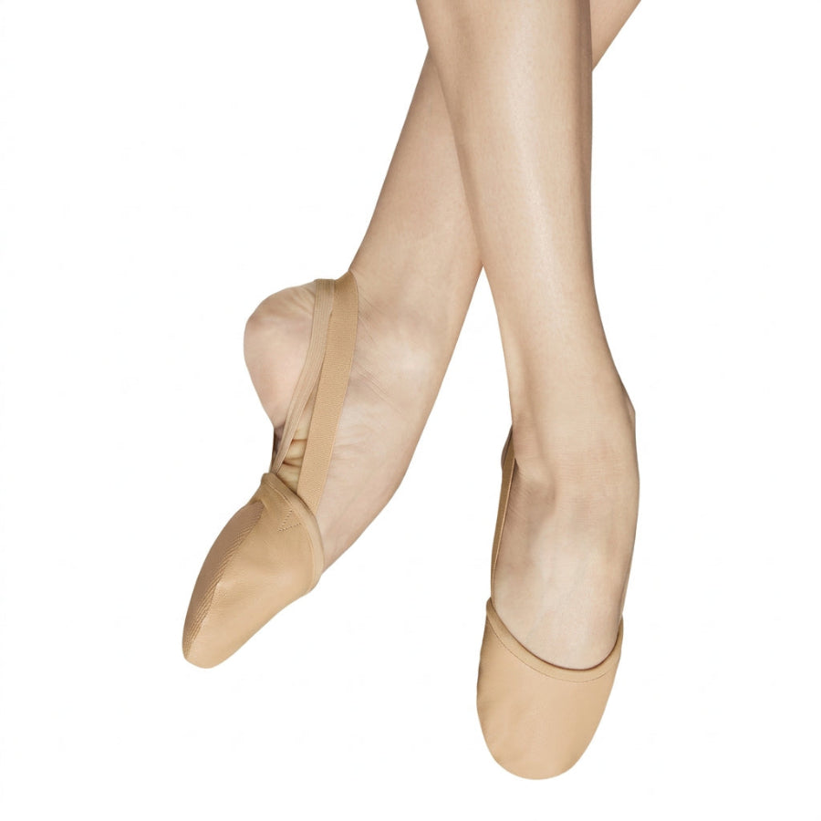 BLOCH The Revolve Half Sole. Features a widened, flat microcell front sole for maximum turn ability. Silicon backing on elastic strap to prevent strap from slipping while on foot. Soft leather that shapes and conforms to your foot. Rounded toe shape for perfect lines. Sand Leather.