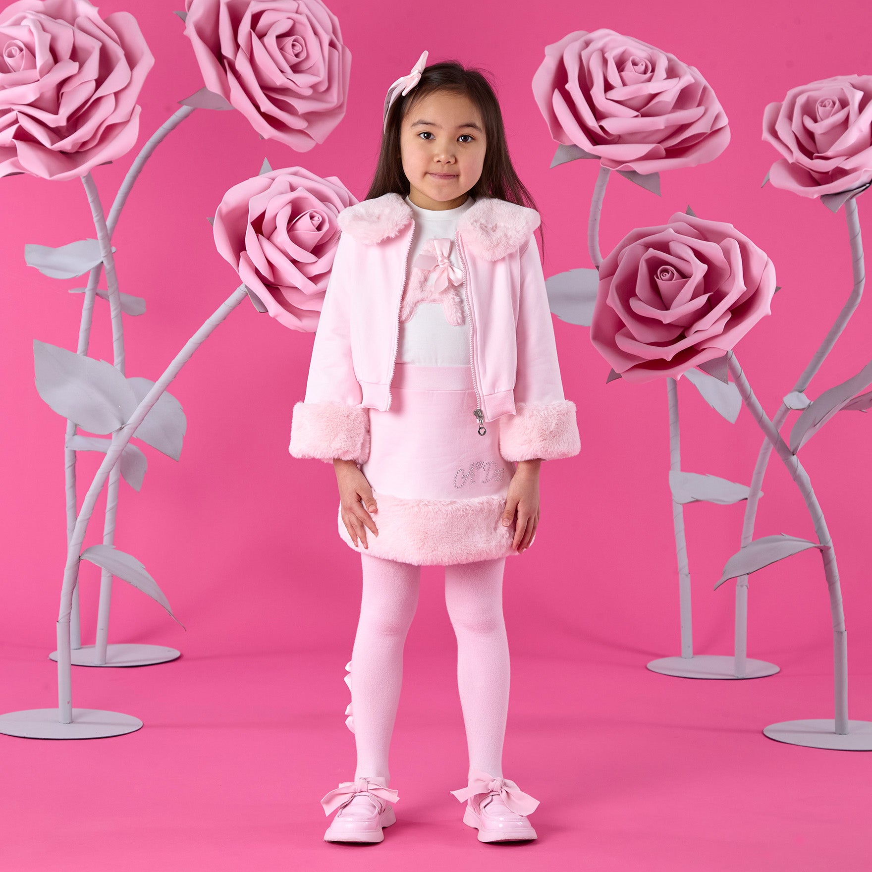 ADEE Winter Bloom Collection. The Audrey Bomber features gorgeous fur trim detailing and a classic diamanté A*Dee logo across the back. Pale Pink