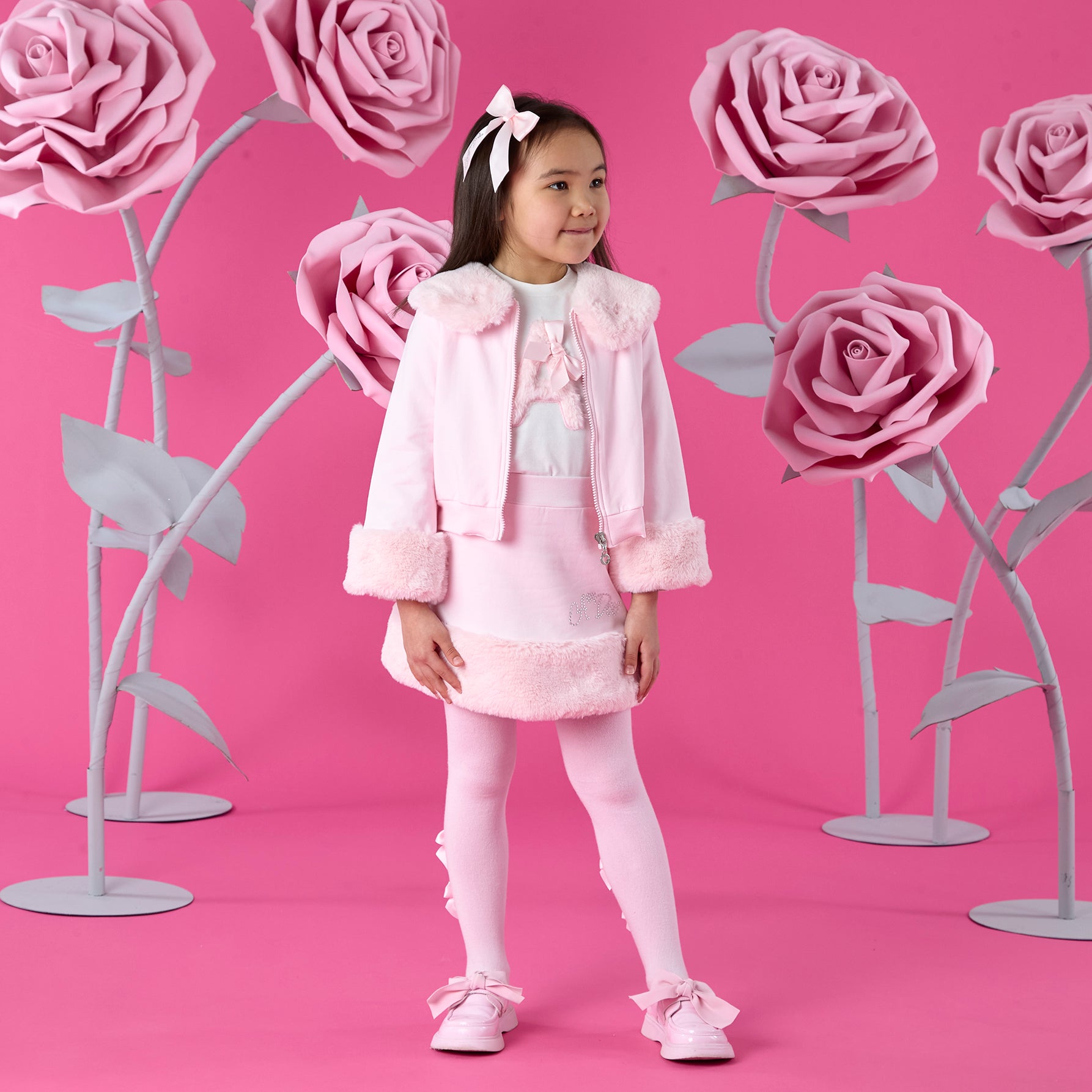 ADEE Winter Bloom Collection. The Audrey Bomber features gorgeous fur trim detailing and a classic diamanté A*Dee logo across the back. Pale Pink