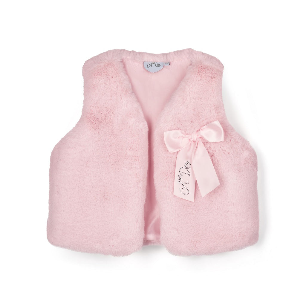 ADEE Winter Bloom Collection. The Ana Faux Fur Gilet comes in a gorgeous pink shade, finished with a beautiful appliqué bow on the chest. Pale Pink