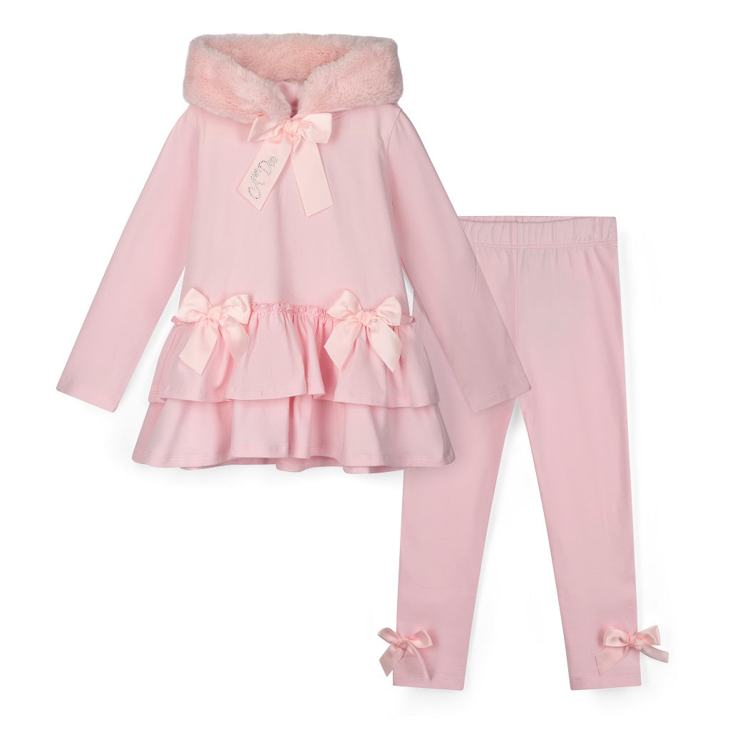 ADEE Winter Bloom Collection. The Alina Legging Set is the perfect addition to your Winter wardrobe! Featuring a fur trimmed hooded top with applique bows and frilled hems. Paired with matching leggings with applique bows at the ankle. Pale Pink