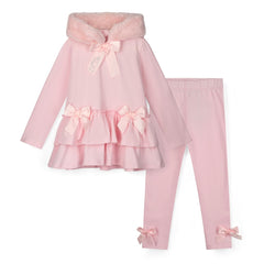 ADEE Winter Bloom Collection. The Alina Legging Set is the perfect addition to your Winter wardrobe! Featuring a fur trimmed hooded top with applique bows and frilled hems. Paired with matching leggings with applique bows at the ankle. Pale Pink