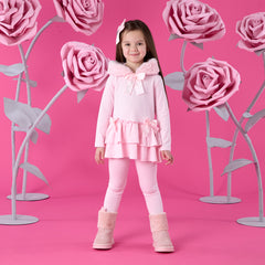 ADEE Winter Bloom Collection. The Alina Legging Set is the perfect addition to your Winter wardrobe! Featuring a fur trimmed hooded top with applique bows and frilled hems. Paired with matching leggings with applique bows at the ankle. Pale Pink