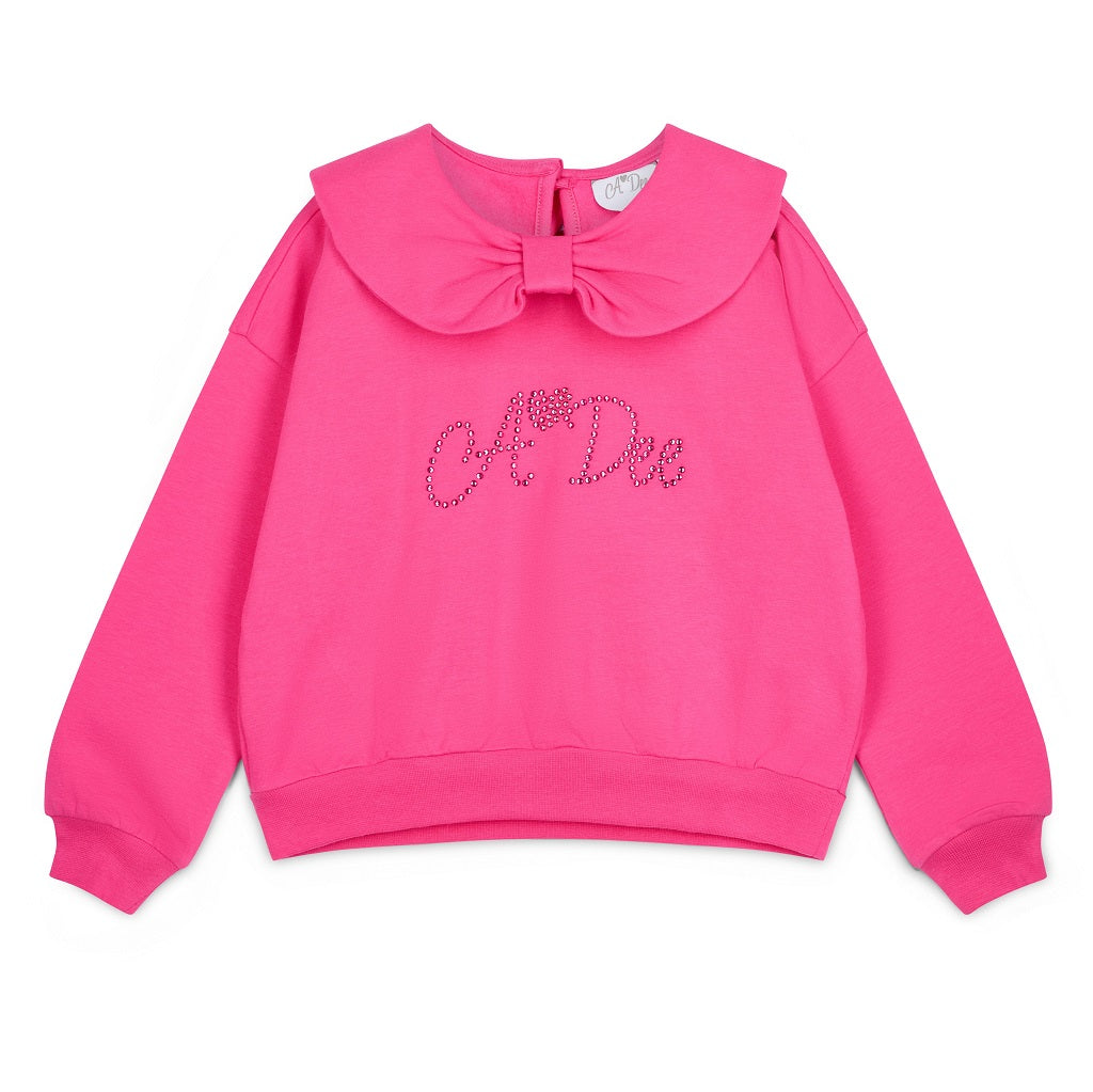 ADEE Winter Bloom Collection. The Amara Set features a sweatshirt with a beautiful bow collar and sparkling A*Dee diamante branding, paired with matching flares finished with a classic diamante “A” on one leg. Fuchsia