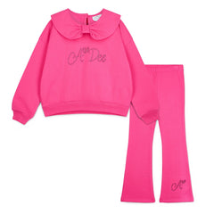 ADEE Winter Bloom Collection. The Amara Set features a sweatshirt with a beautiful bow collar and sparkling A*Dee diamante branding, paired with matching flares finished with a classic diamante “A” on one leg. Fuchsia