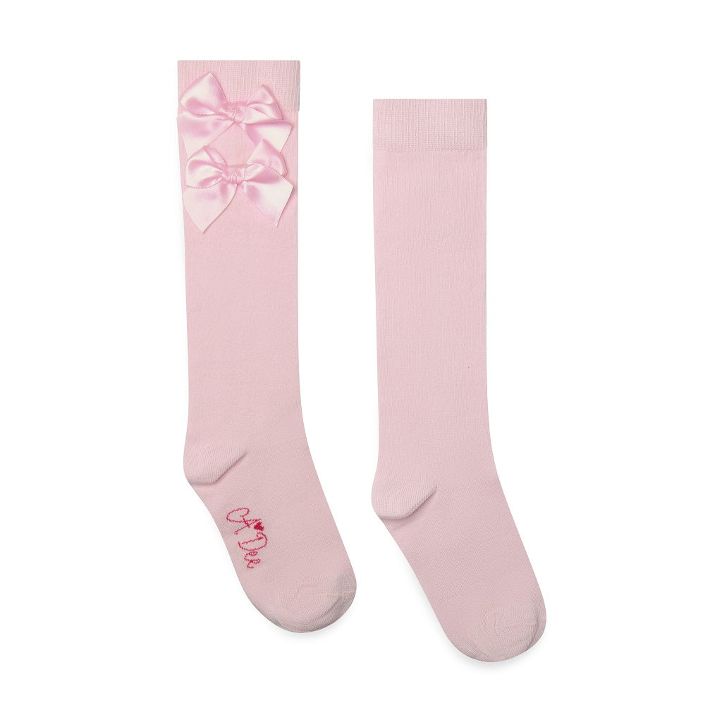 ADEE Winter Bloom Collection. A cute finishing touch, the Ariel knee-high socks are detailed with two sweet appliqué bows at the ankle. Pale Pink