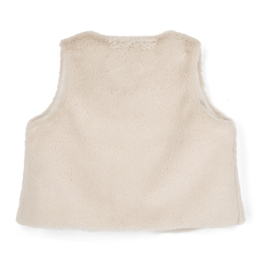 ADEE Eau-de Adee Collection. The Anna gilet come in fabulous faux fur and is finished with a beautiful appliqué bow on the chest. Stone Beige