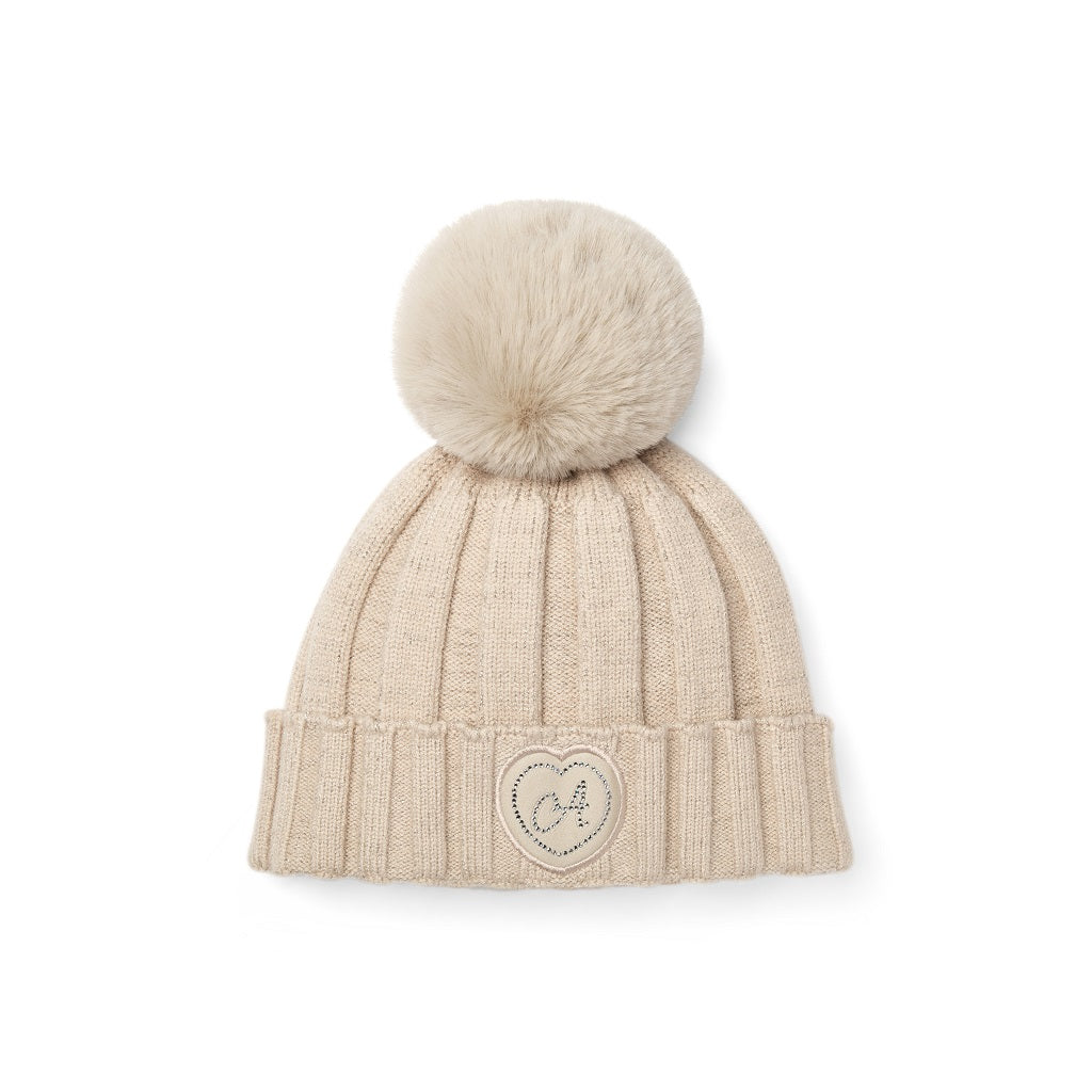 ADEE Eau-de Adee Collection. Complete the look with this knitted hat with faux fur pom pom and diamante branded artwork. Stone Beige