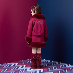 ADEE Chevron Charm theme. The Audrey Bomber features gorgeous fur trim detailing and a classic diamanté A*Dee logo across the back. Deep Cherry
