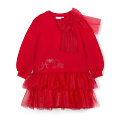 ADee The Brandy Dress features a glitter tulle double-frill skirt, long puff sleeves, and a statement appliqué bow. Perfect for festive Christmas parties. Red