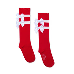 ADEE Complete the look with the red Astrid knee high sock. Finished with a contrast white stripes and satin bows.