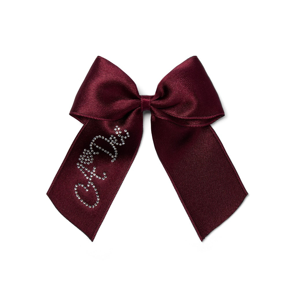ADEE Chevron Charm Collection. Add the perfect finishing touch with the Ariah Bow complete with the signature A*Dee diamante logo. Deep Cherry