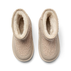 ADEE A cosy update to everyday footwear, the Teddie boots are crafted from soft faux suede and finished with a chunky sole and signature logo detail. Stone Beige