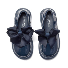 ADEE The Lyra shoe is perfect for school, with pretty bows on the velcro strap and embroidered logo to the side. Finished with non-slip rubber soles. Navy