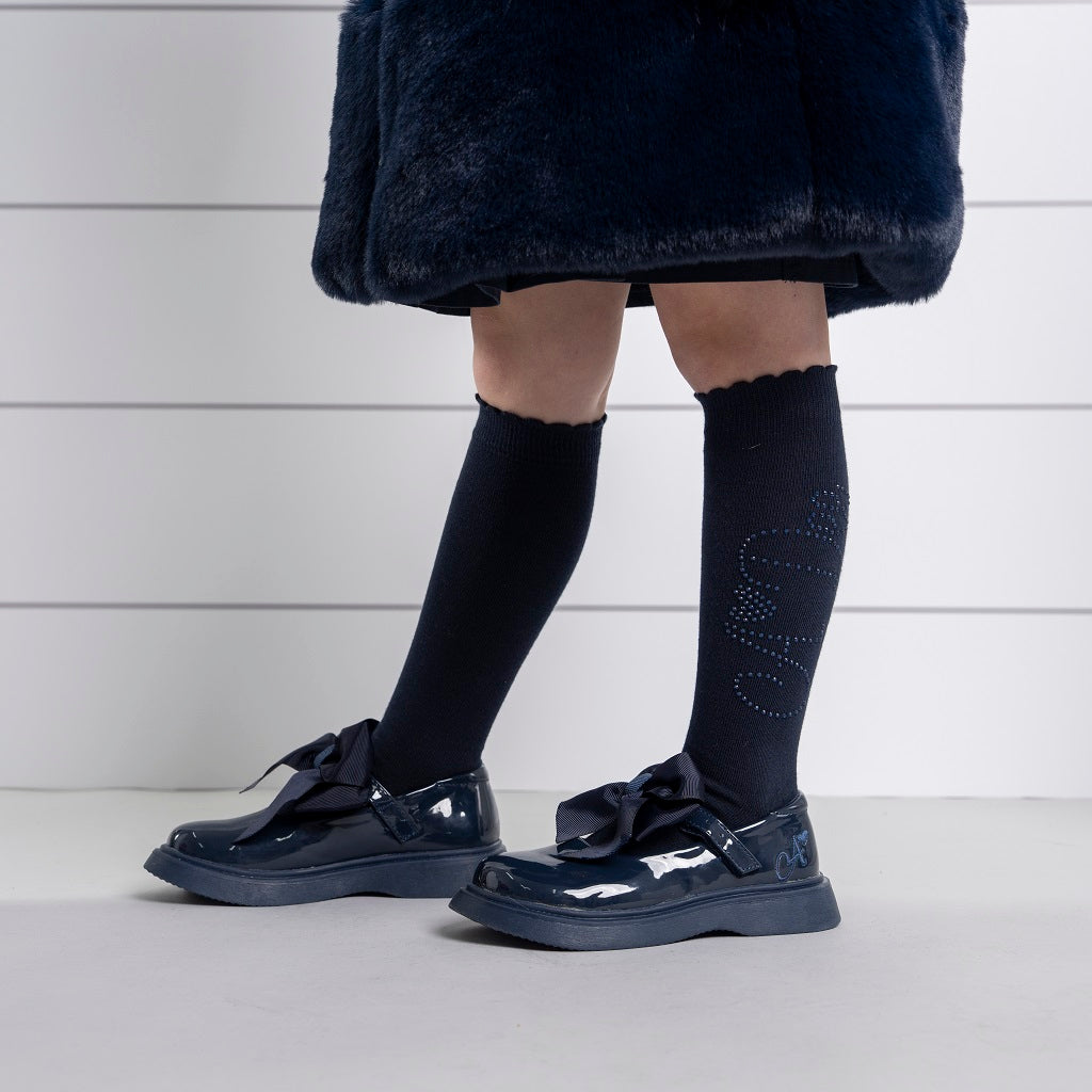ADEE Complete your back to school outfit with the Seren knee high socks. Featuring a sparkling diamante logo on each side. Dark Navy